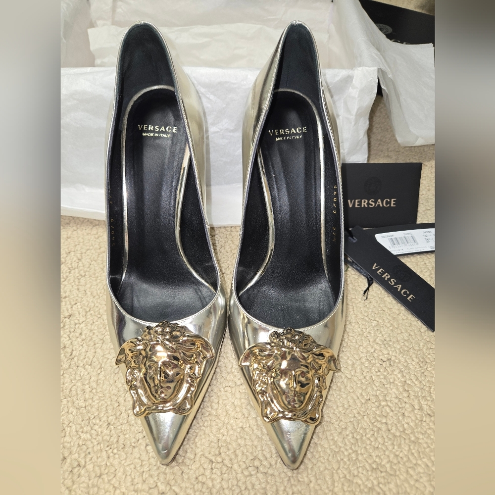 Versace gold metallic medusa head pallazo pumps.